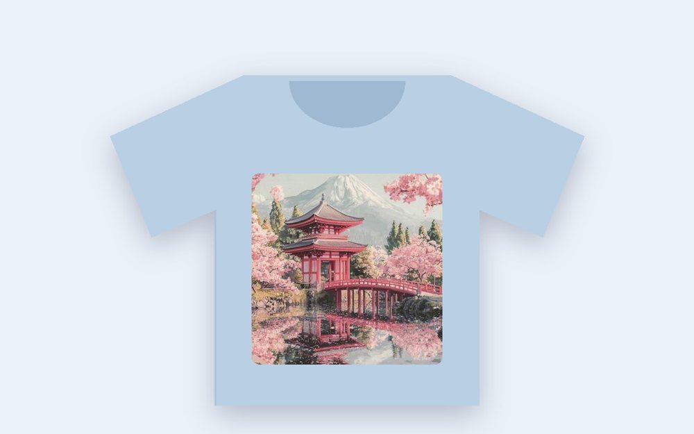 A blue t-shirt printed with a picture of a pink pagoda (mock up)